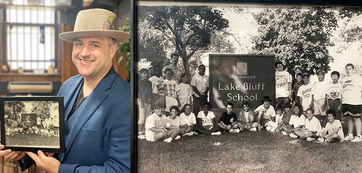 John McLaughlin holding a picture from when he was in the 5th grade at Lake Bluff, the image of which can be seen on the right side of the image.