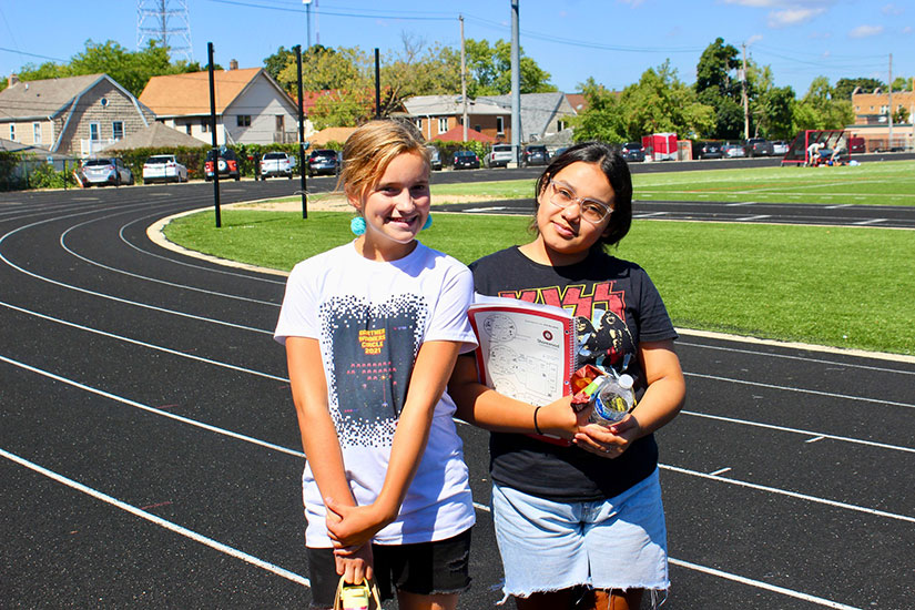 Shorewood students pose for a picture on the high school running track.